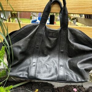 Tumi Black Leather Travel Bag